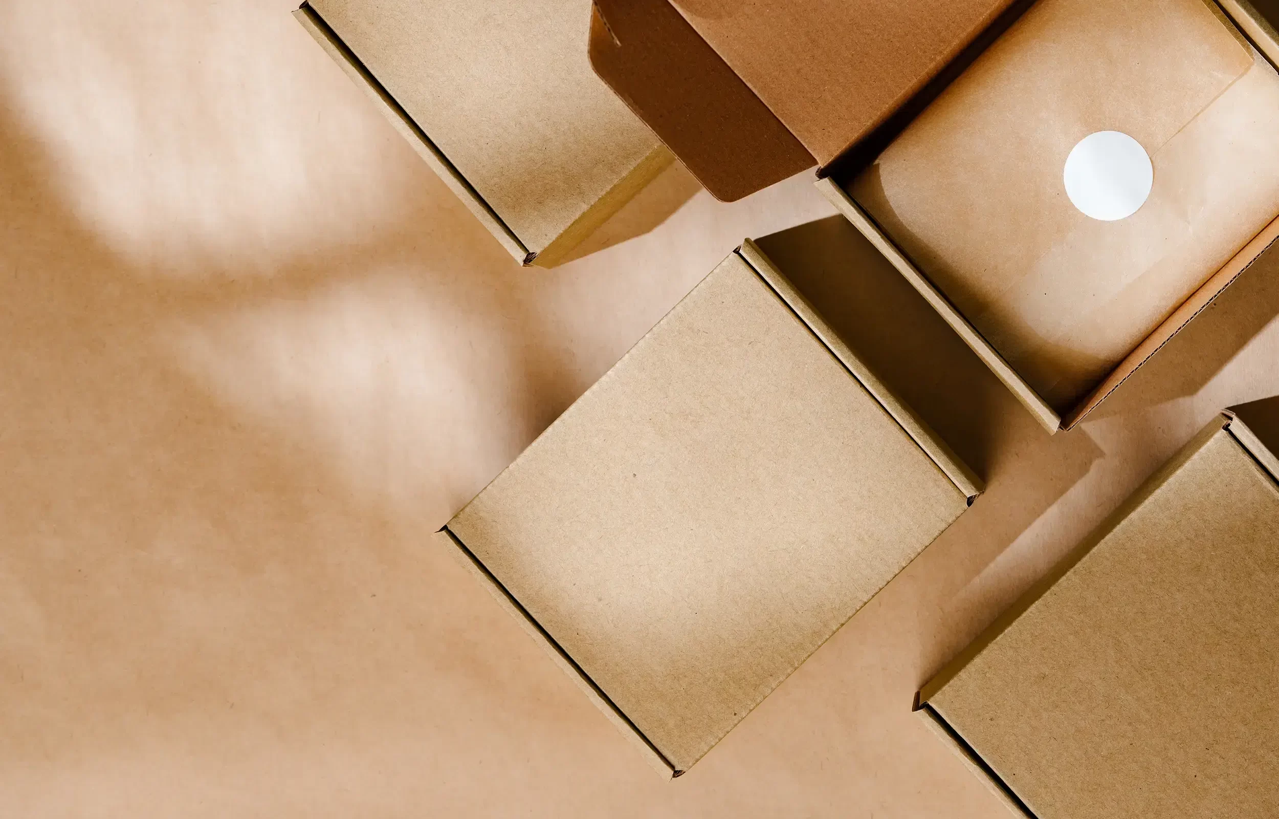 brown-cardboard-boxes-arranged-neatly-on-a-workspa-2025-02-25-02-44-46-utc